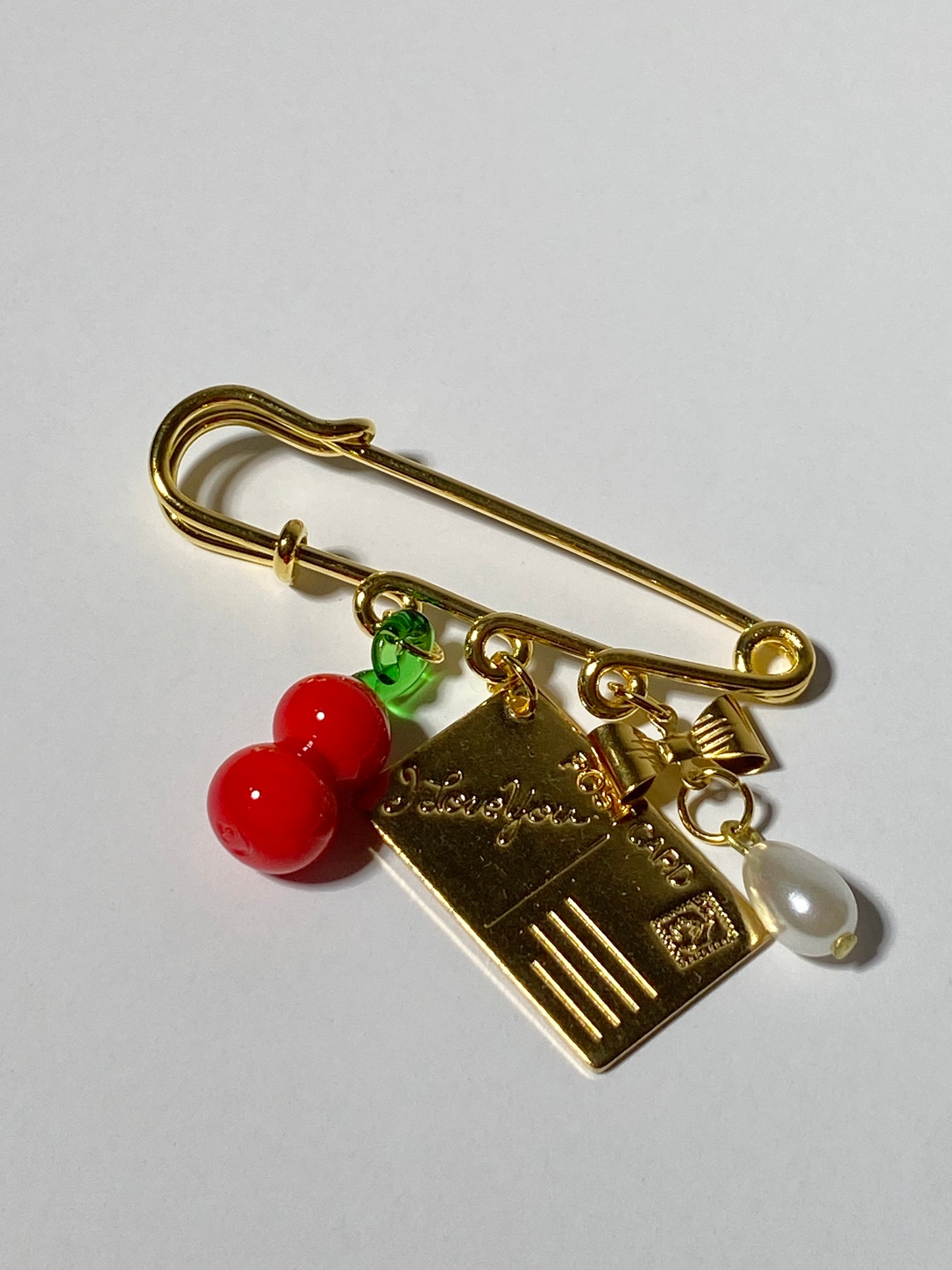 Charm Brooch